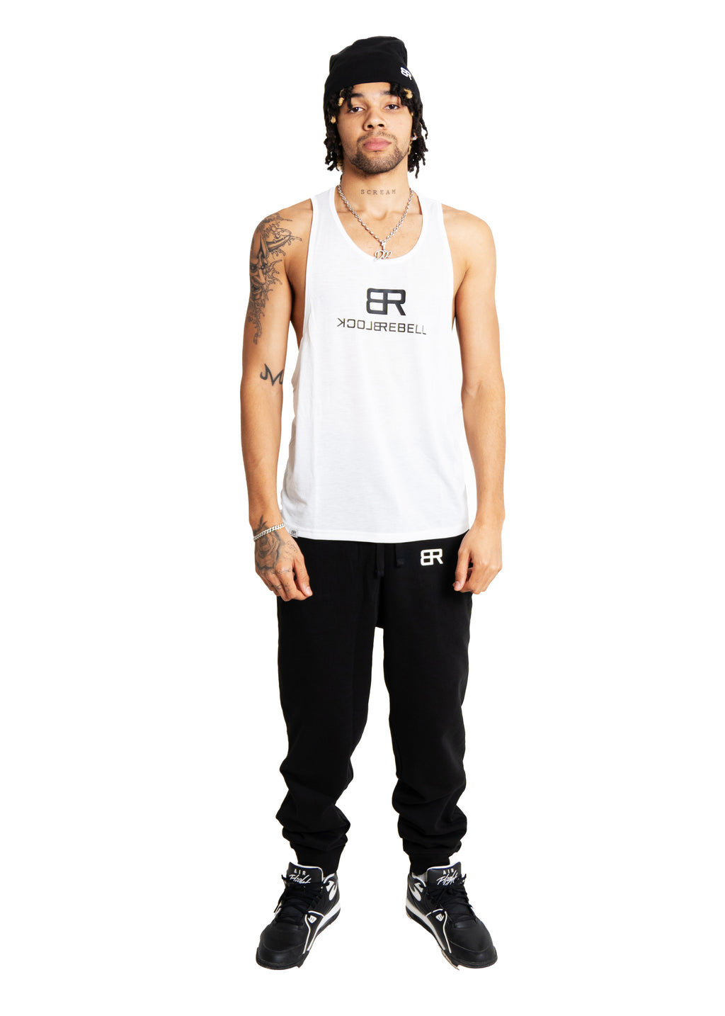 Athlet trägt BlockRebell Tanktop – sportlicher Look mit Statement-Mentalität